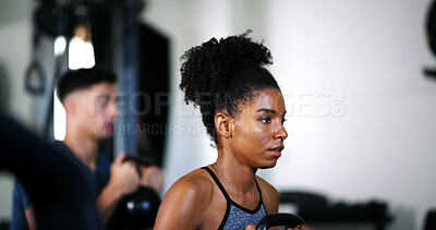 Buy stock photo Fitness, serious and weightlifting with woman in gym for exercise, strength training or workout. Bodybuilding, challenge and kettle bell with person in health club for active routine or session