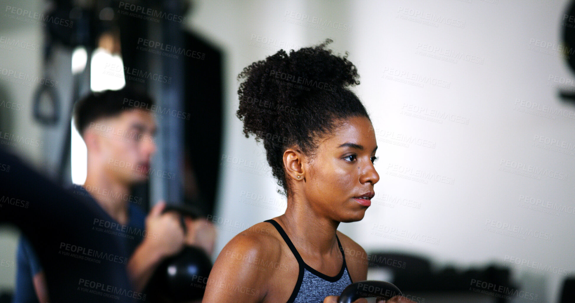 Buy stock photo Fitness, serious and weightlifting with woman in gym for exercise, strength training or workout. Bodybuilding, challenge and kettle bell with person in health club for active routine or session
