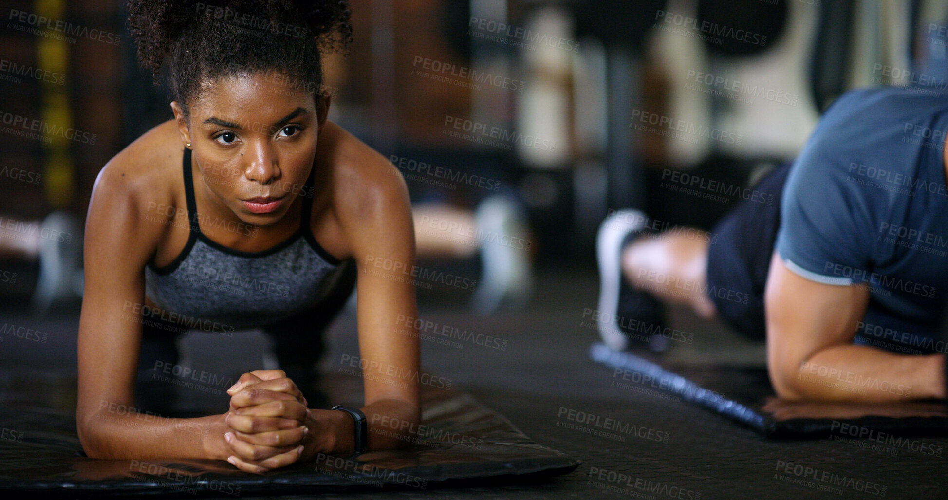 Buy stock photo Woman, people and plank in gym with workout, strength training and control breathing for wellness. Serious, person and balance on floor with stability, fitness challenge and exercise class for abs.