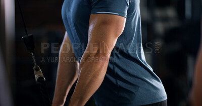Buy stock photo Arms, man and exercise with rope machine for fitness, muscle development or training in gym. Body builder, biceps or equipment in wellness center for workout, strength or intense challenge with sweat