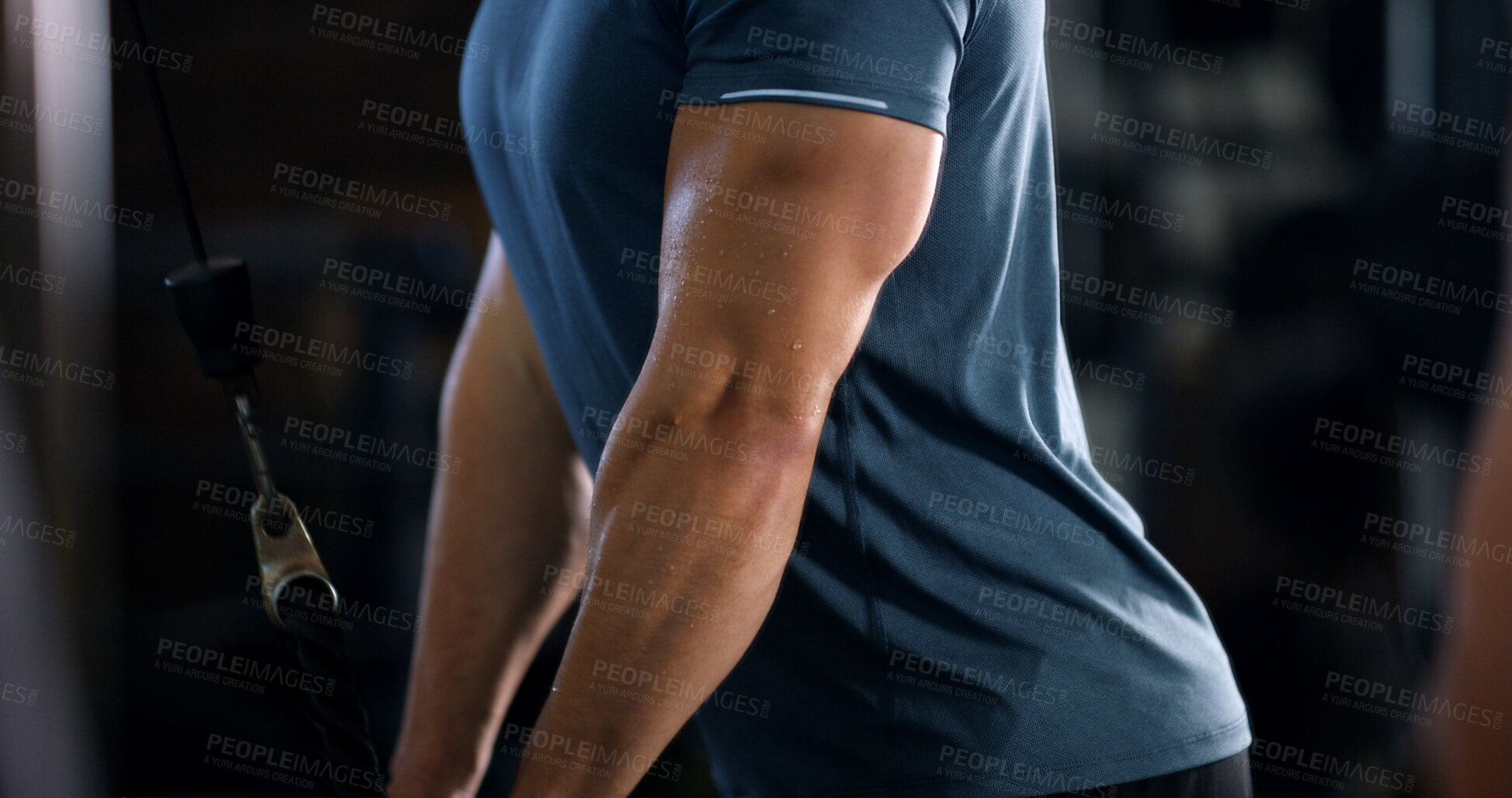 Buy stock photo Arms, man and exercise with rope machine for fitness, muscle development or training in gym. Body builder, biceps or equipment in wellness center for workout, strength or intense challenge with sweat