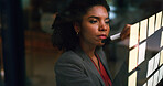 Night, businesswoman and writing on glass with sticky note, brainstorming and plan for audit deadline. Space, auditor or black person work late in office with strategy, problem solving or objectives.