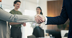 Business people, shaking hands and deal with success at office, welcome or goals at finance agency. Partnership, handshake and motivation for promotion, support or agreement at investment company