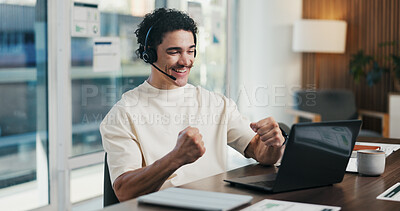 Buy stock photo Man, headset and celebration with laptop at office for trading, goals and fist pump at finance agency. Person, virtual consultant or advisor with success, computer and voip mic at investment company