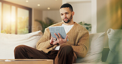 Buy stock photo Tablet, relax and man in apartment to watch show, online search and video entertainment on sofa. Tech, chill and person at home for streaming movie, subscription service or download film on internet