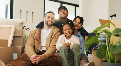 Buy stock photo Portrait, parents and moving in new home with children, package and smile for property investment. Happy people, mother and father in house with girl kids, boxes and family bonding for relocation.