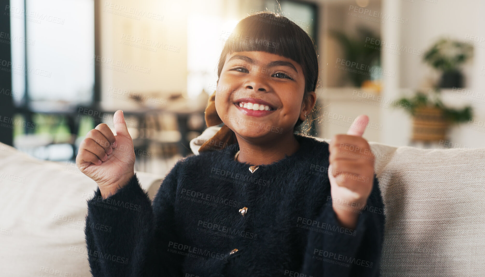 Buy stock photo Portrait, child and smile in living room with thumbs up, goal and milestone for childhood development. Happy, young girl and hand gesture in home with like emoji, achievement and success for growth.