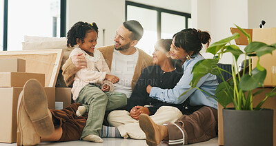 Buy stock photo Real estate, parents or kids in living room with boxes, fresh start or happiness at dream house. Relocation, smile or people in home with embrace, family property or mortgage for new homeowners.