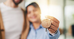 Property, couple and hand in house with key, fresh start and investment in dream home. Real estate, flare and people with milestone together, purchase success or moving achievement for new homeowners