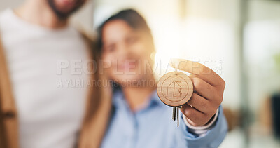 Buy stock photo Property, couple and hand in house with key, fresh start and investment in dream home. Real estate, flare and people with milestone together, purchase success or moving achievement for new homeowners