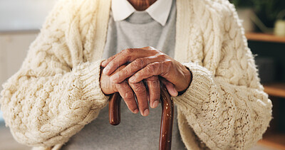 Buy stock photo Cane, hands and senior person in home living room for assistance, balance or retirement. Healthcare, walking stick or wellness and old man with disability in apartment for break, relax or weekend