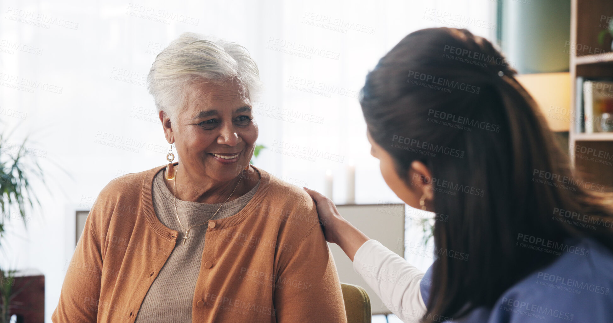 Buy stock photo Home, nurse and old woman with happy conversation, social wellness or support for health. Caregiver, retirement and senior person with smile for friendly discussion, kindness and medical advice