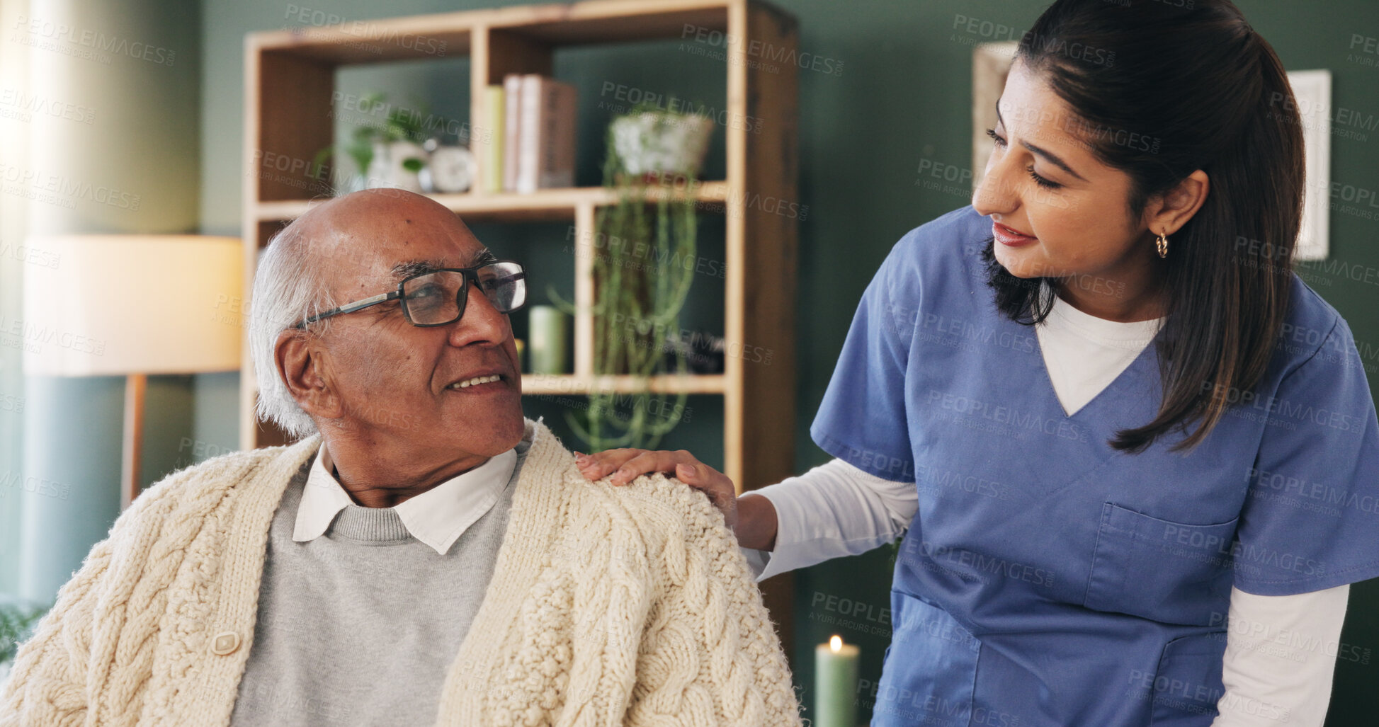 Buy stock photo Home, nurse and senior man with happy conversation, retirement and support for wellness. Caregiver, talking and elderly patient with smile for friendly discussion, advice and medical service