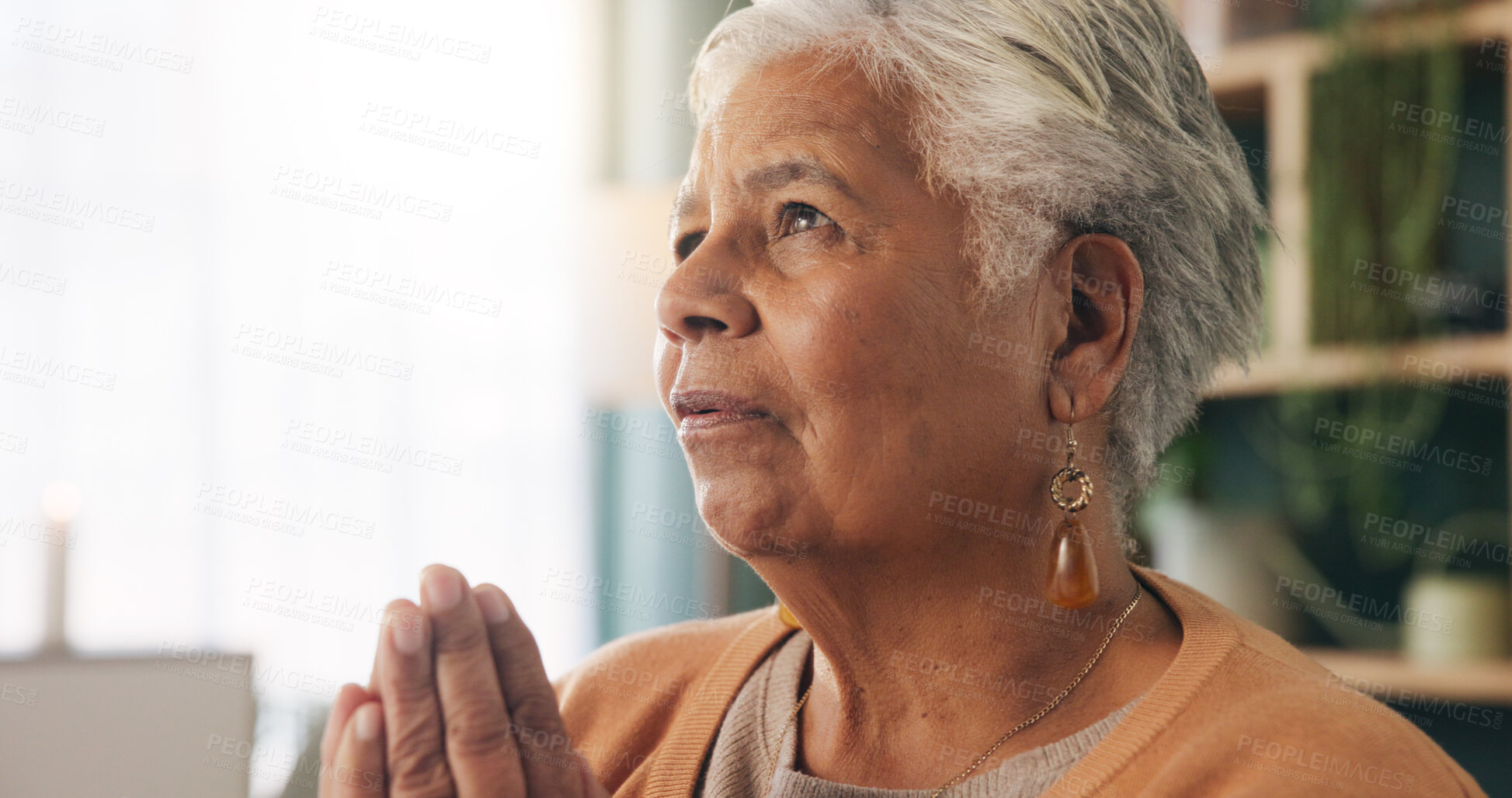 Buy stock photo Faith, prayer and old woman in house for worship, express gratitude and blessings with hope. Elderly person, hands together and praying in retirement with religion, spiritual guidance and belief
