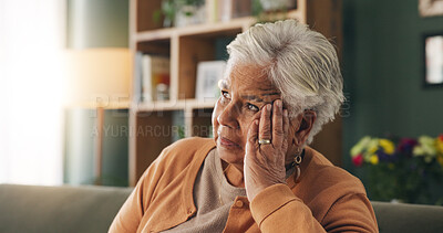 Buy stock photo Thinking, stress and senior woman on sofa in home with planning, retirement funds or savings. Ideas, choice and elderly female person with decision, pension or finance in living room at house.