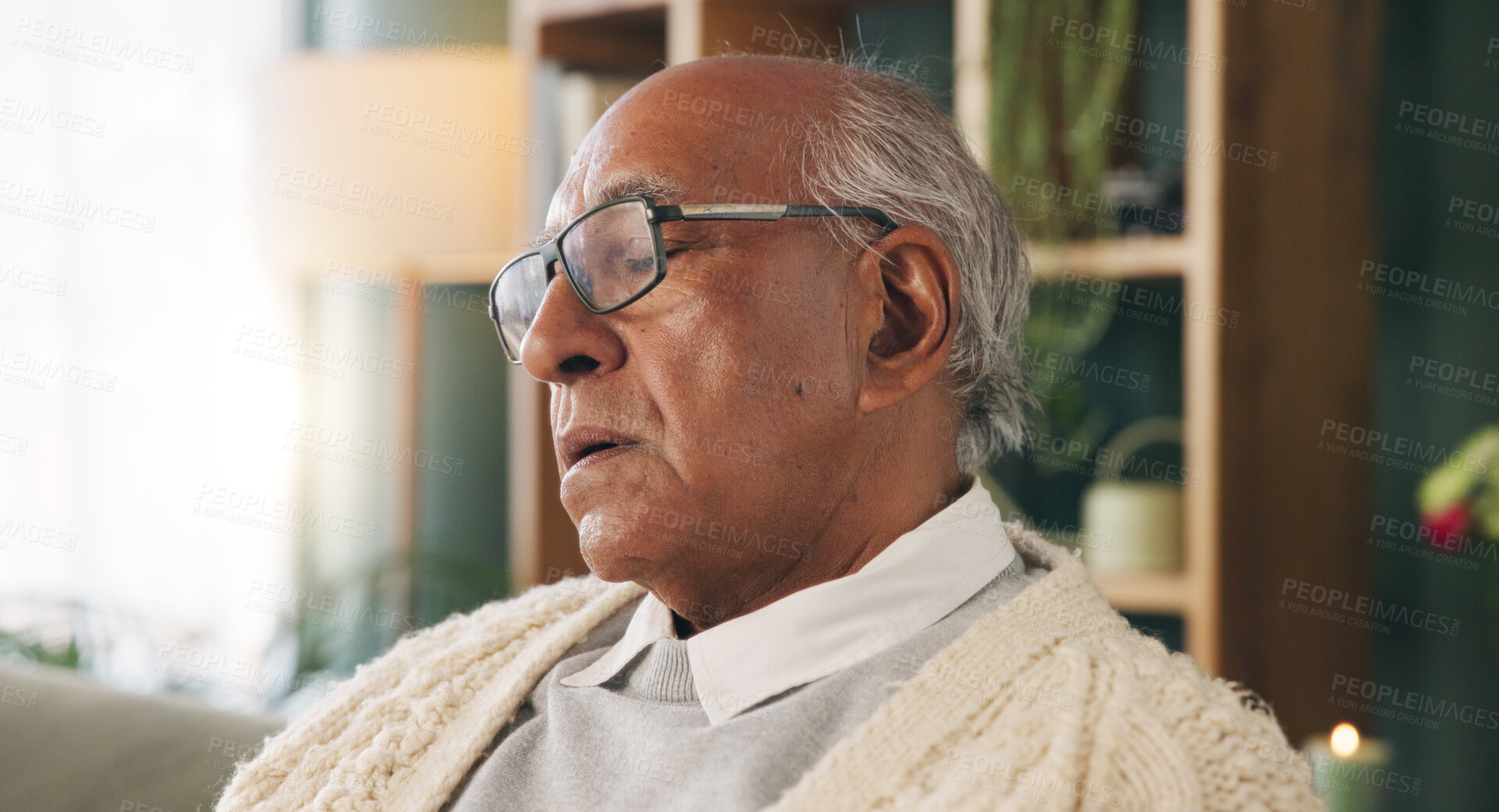 Buy stock photo Tired, sleeping and old man in living room with rest, glasses and peaceful retirement in nursing home. Elderly person, fatigue and relax on couch wellness, calm and afternoon nap for stress relief.