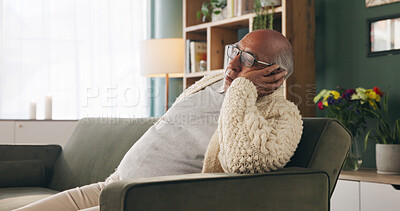 Buy stock photo Tired, sleeping and senior man in living room with rest, glasses and peaceful retirement in nursing home. Elderly person, fatigue and relax on couch wellness, calm or afternoon nap for stress relief.