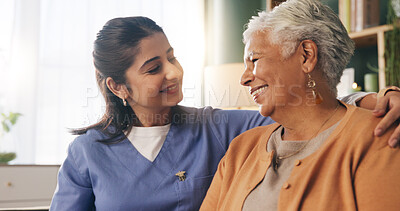 Buy stock photo Medical, hug and smile of old woman with nurse in retirement home for assisted living. Healthcare, support and thank you with senior person embracing caregiver in apartment for rehabilitation