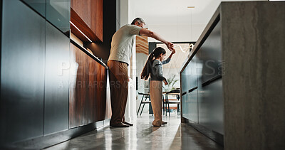 Buy stock photo Dance, dad or girl in kitchen with bonding together, childcare or fun time in healthy relationship. Love, parent or kid in house with rhythm, childhood play or happy moment with family connection.