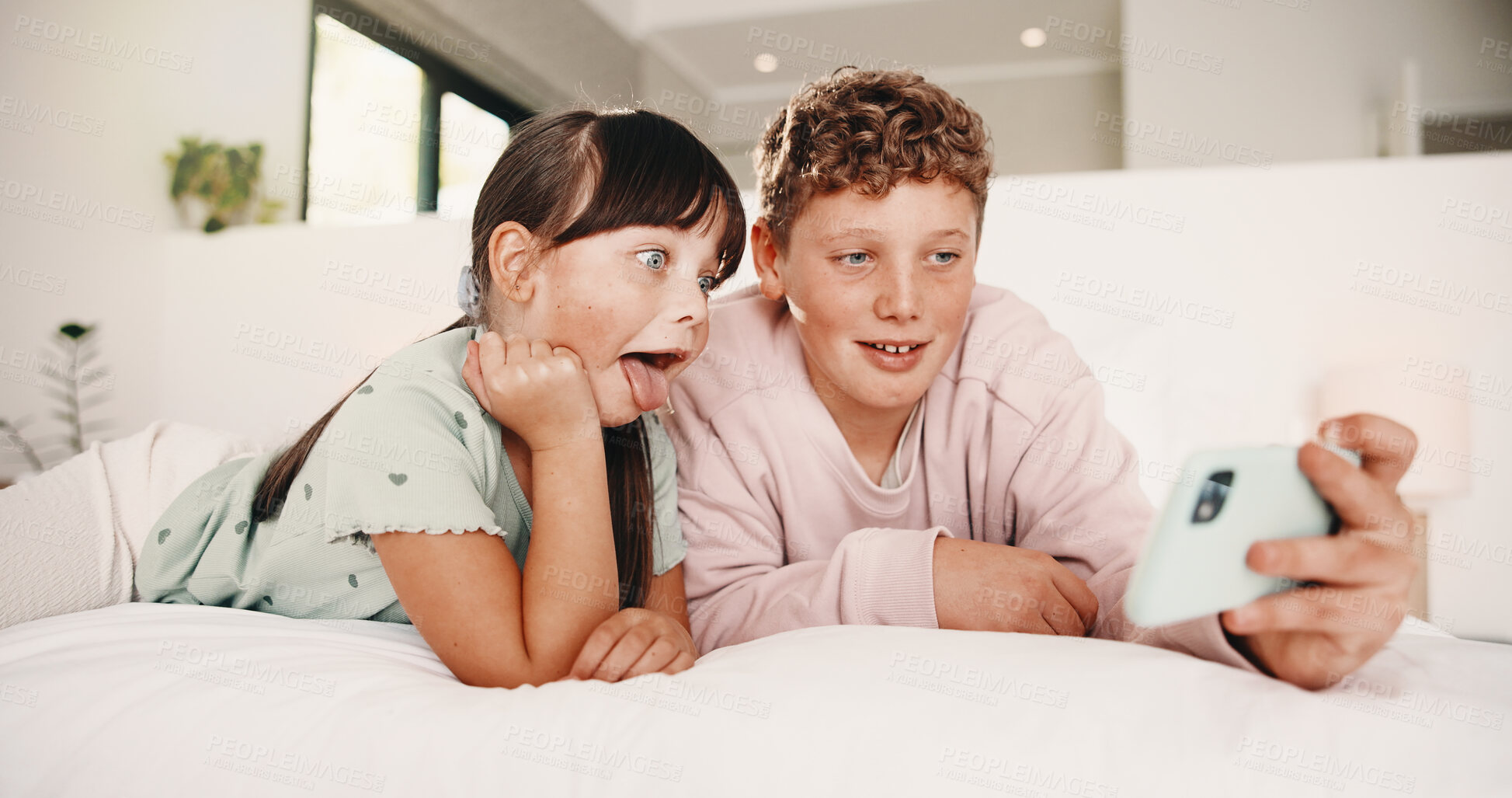 Buy stock photo Selfie, boy and girl with funny face in bedroom, social media post and memory of siblings bonding. Photography, smile or children with morning picture for web update, tongue out or connection in home
