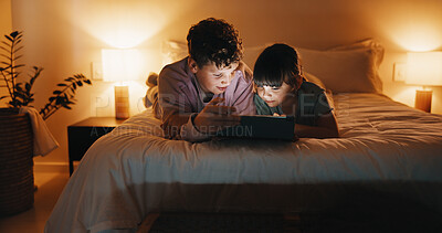 Buy stock photo Night, relax and children with tablet in bedroom for game, streaming cartoon or watch show. Tech, siblings and kids on bed at home for movie, subscription service and entertainment on internet