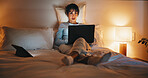 Streaming, night or woman on bed with laptop, movie binge or video watching on digital site. Evening, comfy or mature person in home with tech, series subscription or search on entertainment platform