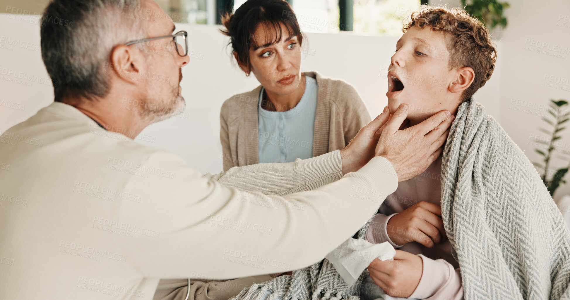 Buy stock photo Parents, check and sick child in home, tonsils and virus infection with health care for flu symptoms. Illness, mom and dad with boy, inflammation assessment or sore throat for allergy in family house