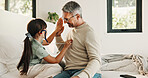 Child, high five and stethoscope with father in home for good news, pretend doctor and bonding. Man, daughter and medical tools for fantasy checkup, healthcare role play and celebration for treatment