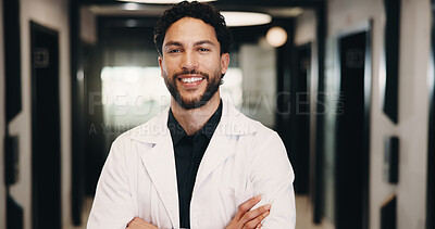 Buy stock photo Man, doctor and portrait with confidence in hospital hallway for medical assistance, advice or help. Male person, healthcare worker or smile with arms crossed for health service or wellness in clinic
