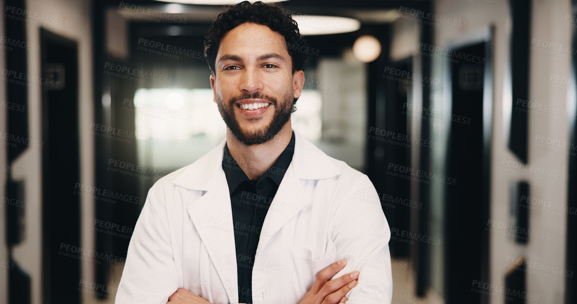 Buy stock photo Man, doctor and portrait with confidence in hospital hallway for medical assistance, advice or help. Male person, healthcare worker or smile with arms crossed for health service or wellness in clinic