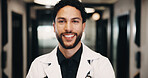 Happy, man and doctor in hospital with portrait, knowledge and experience for healthcare service. Male person, smile and medical worker in clinic with expertise, about us and pride for patient care.