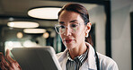 Healthcare, doctor and woman with tablet in clinic, reading report or update records for insurance. Tech, serious and mature person in hospital for research, medical history and review schedule