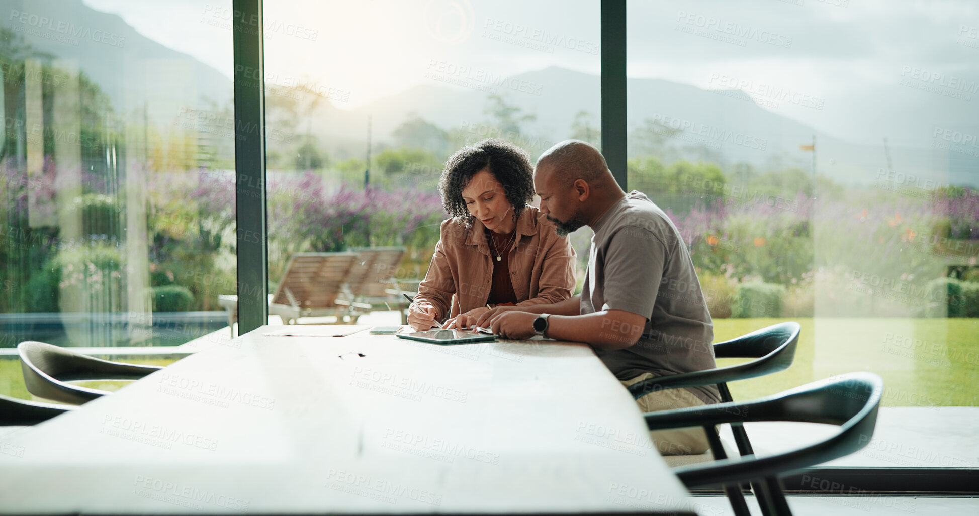 Buy stock photo Paperwork, discussion and couple with tablet in home with planning for budget, savings or investment. Documents talk and man with woman for conversation on mortgage application on digital technology.