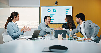 Buy stock photo Meeting, handshake and congratulations in office with business people for company profit, revenue and pitch. Agreement, graphs and financial manager with team for budget, approval or promotion