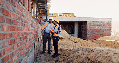 Buy stock photo Team, inspection and men with tablet at construction site, civil engineer and project update on web. Outdoor, architecture and people with tech for property development, talking and quality assurance