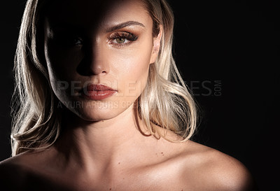 Buy stock photo Woman, beauty and makeup in studio with shadow, portrait and glow with space on black background. Girl, cosmetics and serious with lipstick, spotlight and creative with art deco in New Zealand