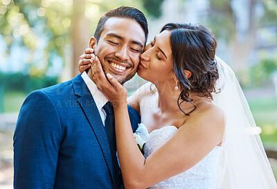 Buy stock photo Kiss, smile and couple at wedding outdoor for marriage, love or trust with happiness in nature. Bride, groom and people with affection, partner and support for connection with romance in park