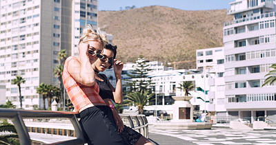 Buy stock photo Women, view and outdoor in city with sunglasses for bonding, reunion and smile for weekend visit. Excited, best friends and tourism in urban town with exploring, support and travel for vacation