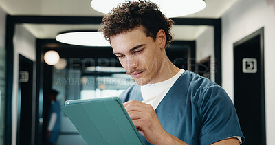 Buy stock photo Nurse, man and writing in clinic with tablet, browsing and online research for medical internship. Person, healthcare intern and typing in hospital with tech, stylus and digital notes for case study.