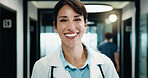 Portrait, woman and doctor with smile in hospital for diagnosis, medical advice and patient care. Happy, mature surgeon and confident for healing experience, healthcare services and cardiology expert