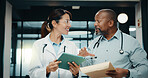 Discussion, meeting or doctors with tablet in clinic, care plan assistance or medical case advice. Smile, tech or mature people with specialist referral for treatment, patient diagnosis or teamwork