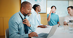 Man, review and laptop in meeting at office with typing, report or insight for notes at finance company. Person, proposal and scroll on computer for feedback, solution or asset management at agency