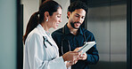 People, doctors and meeting with tablet in hospital for research, review case and medical study. Smile, surgeon and team with digital to confirm diagnosis, planning surgery and healthcare information