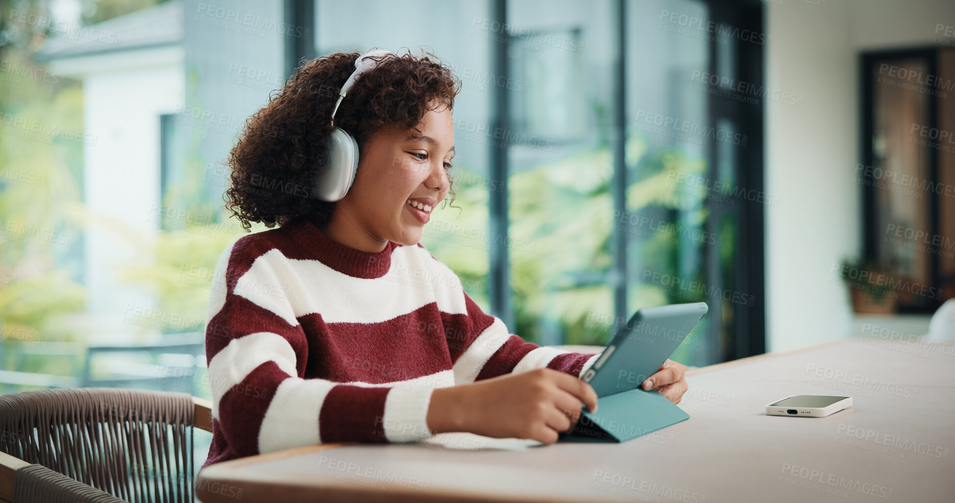 Buy stock photo Tablet, elearning and child with headphones on video call in home for online class with education. Talking, digital technology and girl student with audio tech for virtual lesson in apartment.