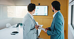 Businessmen, tablet and meeting with analytics for performance review or statistics in office. Male people, employees or colleagues with technology, graph or chart for growth, progress or development