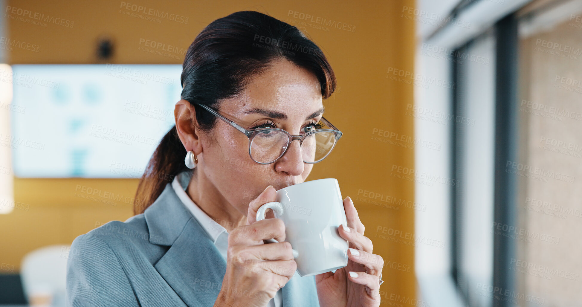 Buy stock photo Woman, coffee and drink at window in office with thinking, break or glasses at insurance company. Person, broker and advisor with beverage, tea cup or perspective for career at risk assessment agency