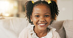 Portrait, child and relax on sofa with smile, positive attitude or childhood development in living room. Happy, young African girl and adorable kid in home with growth, comfortable and weekend break.