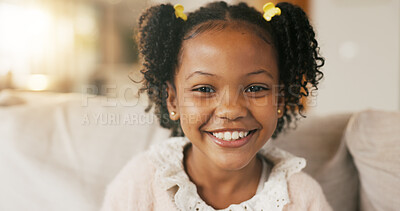 Buy stock photo Portrait, child and relax on sofa with smile, positive attitude or childhood development in living room. Happy, young African girl and adorable kid in home with growth, comfortable and weekend break.