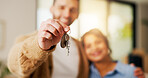 Property, couple and hand in home with key, fresh start and investment in dream house. Real estate, man and woman with milestone together, housing success or moving achievement for new homeowners.