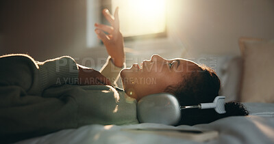 Buy stock photo Child, headphones and sing with girl on bed in home for audio listening or morning streaming. Flare, melody and music with happy kid in bedroom of apartment for playlist or sound subscription